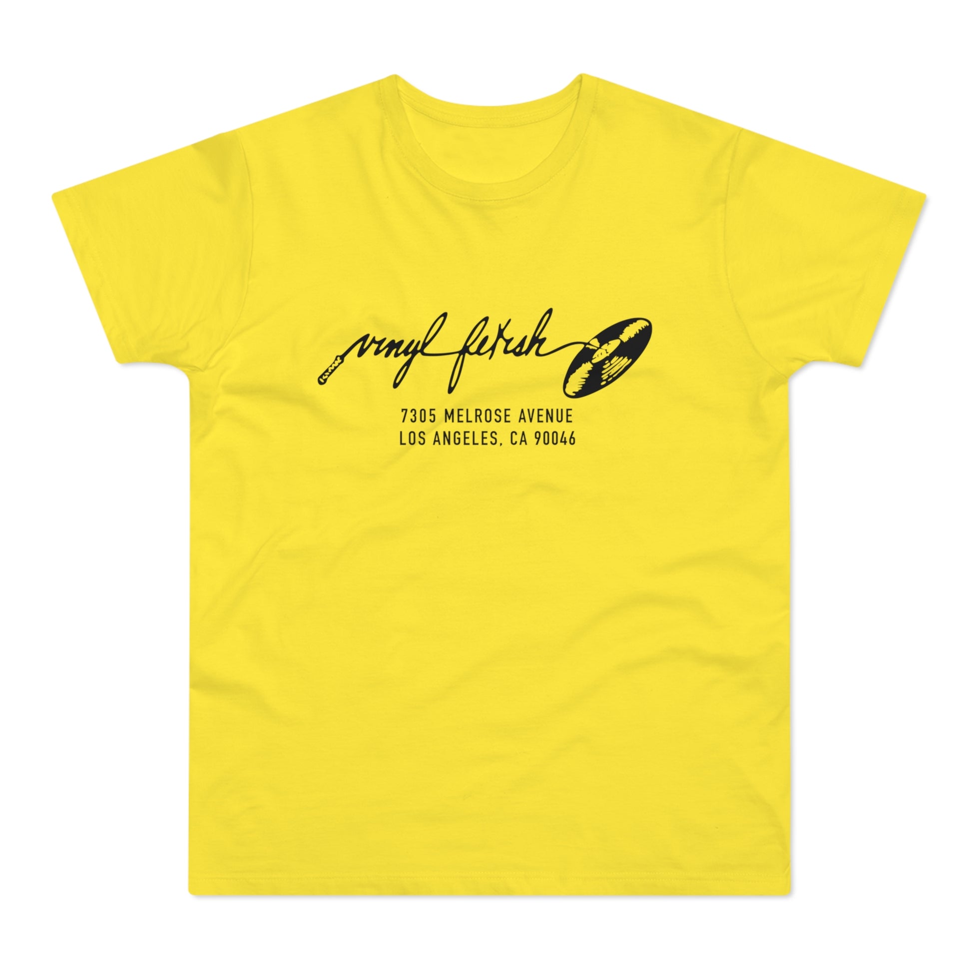 Yellow t-shirt with black "vinyl fetish" text and address details.