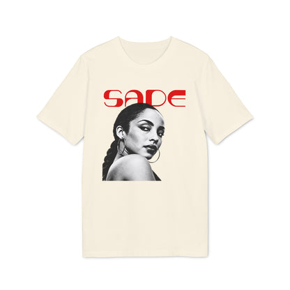 A cream-colored short-sleeved t-shirt featuring a black-and-white portrait of Sade with the red text SADE above it.