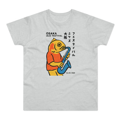 Light grey t-shirt with yellow fish playing saxophone and text "OSAKA JAZZ FESTIVAL 10.09.1989".