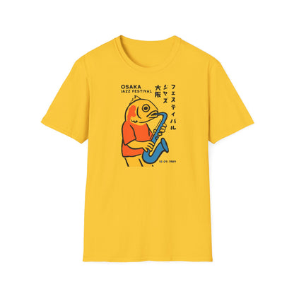Yellow t-shirt with a stylized fish playing a saxophone and Japanese text.