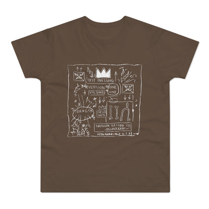 Brown t-shirt with white chalk-like artwork featuring a crown, text, and abstract drawings.