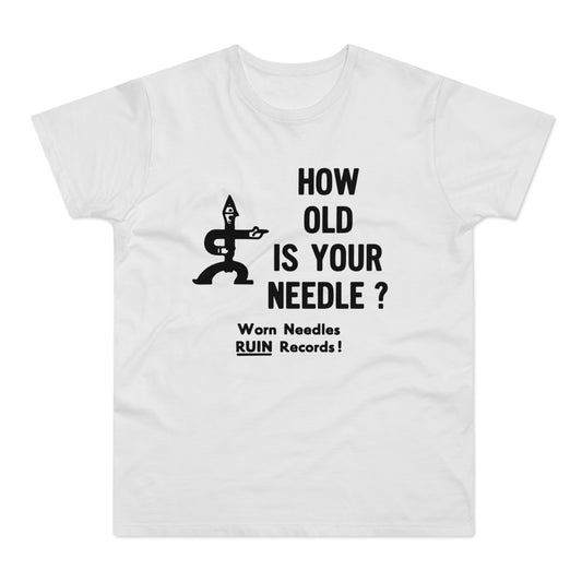 White t-shirt with black text "HOW OLD IS YOUR NEEDLE?" and a graphic of a needle.