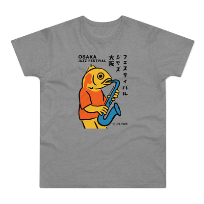 Yellow cartoon fish playing a blue saxophone with Japanese text and "Osaka Jazz Festival 10.09.1989".