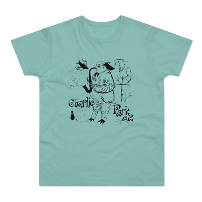 Black ink drawing of bird playing saxophone with "Charlie Parker" text on teal t-shirt.