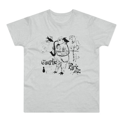 Bird playing saxophone with text "Charlie Parker" below on a light gray t-shirt.