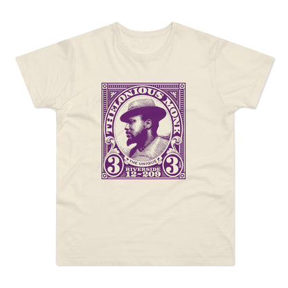 Thelonious Monk portrait artwork on a cream t-shirt with purple stamp design.