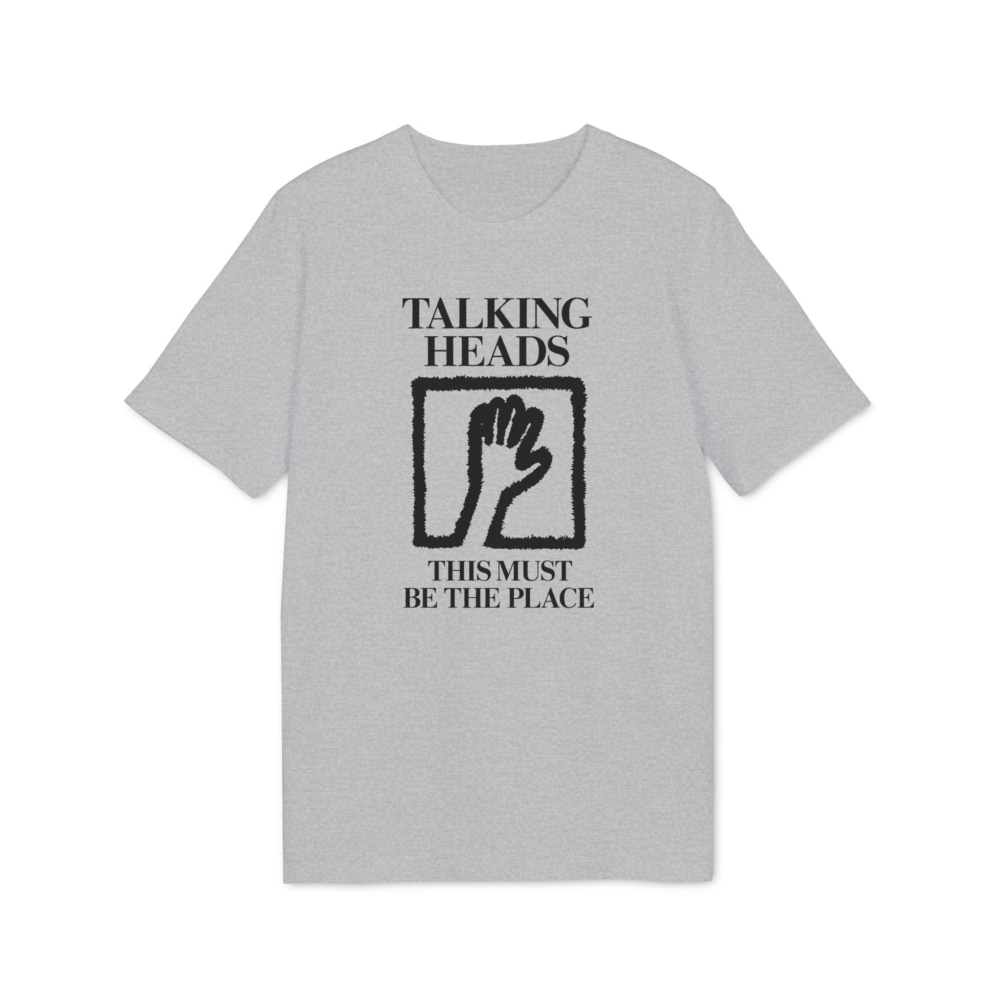 Grey t-shirt with "Talking Heads This Must Be The Place" text and hand graphic.