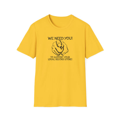 Yellow t-shirt with black text reading "WE NEED YOU!" and "TO SUPPORT YOUR LOCAL RECORD STORE!".