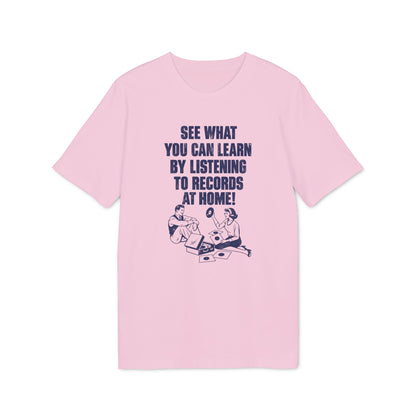 A pink t-shirt featuring dark blue text reading See What You Can Learn by Listening to Records at Home alongside vintage-style illustrations.