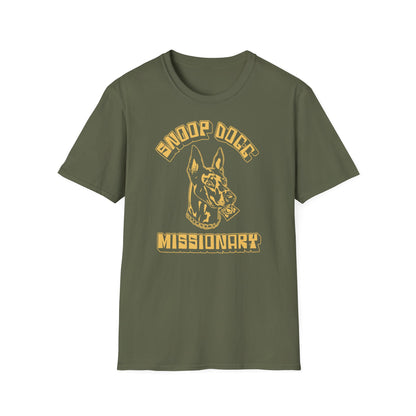 Olive green t-shirt with a graphic of a dog holding a condom and text "Missionary".