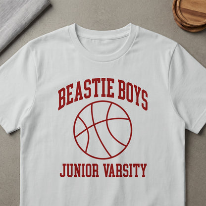White t-shirt with red "BEASTIE BOYS JUNIOR VARSITY" text and basketball graphic.