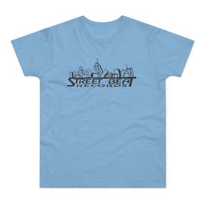 Light blue short-sleeved t-shirt featuring a black graphic of a city skyline with text that reads Street Beat Records.