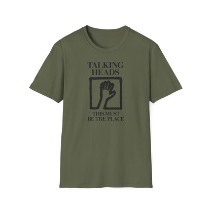 Olive t-shirt with "Talking Heads" and "This Must Be The Place" text and hand graphic.