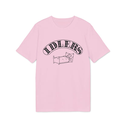 A light pink crewneck t-shirt featuring a black graphic of a bed and the word Idlers.