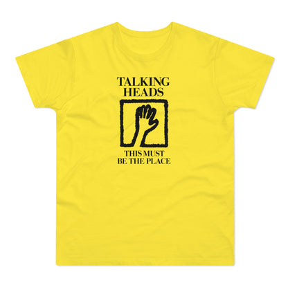 Yellow t-shirt with "Talking Heads" and framed hand motif.
