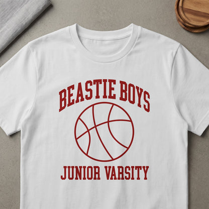White t-shirt with red "Beastie Boys Junior Varsity" text and a basketball graphic.