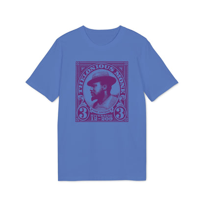 Thelonious Monk portrait stamp graphic on a blue t-shirt.