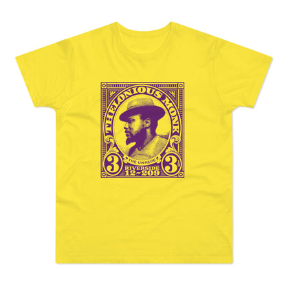 Yellow t-shirt with Thelonious Monk portrait art featuring text.
